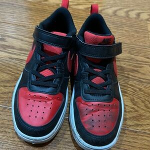 Kids Nike black and red sneakers